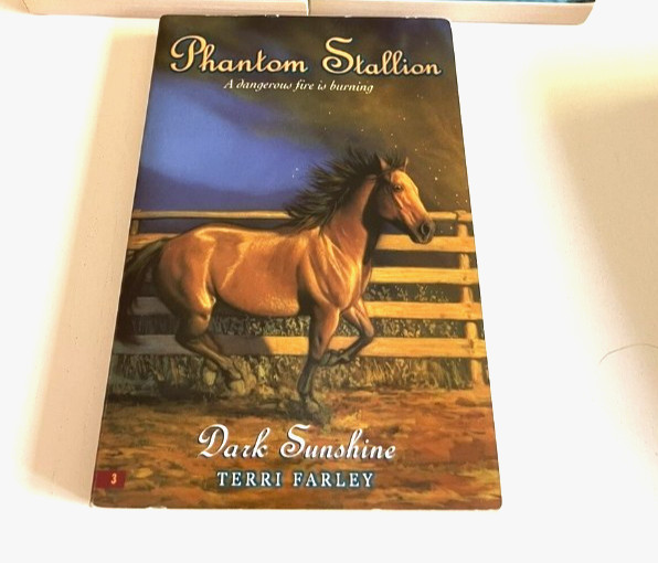 phantom stallion books 234 pages “A dangerous fire is burning” by Terri Farley